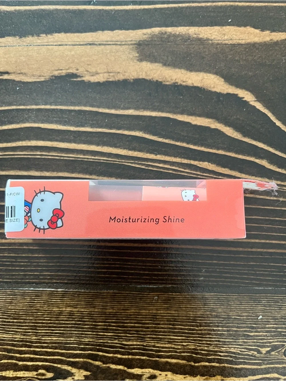 Hello Kitty Peach Tinted Lip Oil - Coral Pink Packaging
